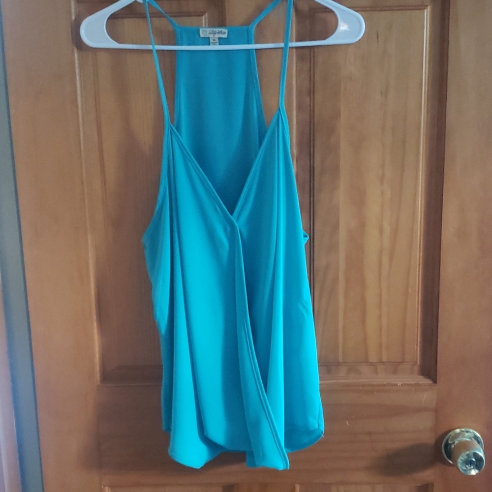 Lilly White brand turquoise flowy split middle top